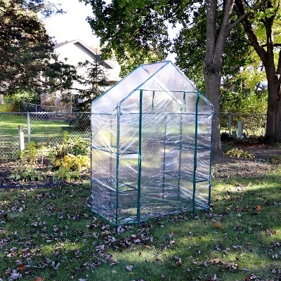 Sunnydaze Decor Sunnydaze Outdoor Portable Tiered Growing Rack Deluxe Walk-In Greenhouse With Roll-Up Door - 4 Shelves - Clear - 54" X 28" X 77" 9 Sunnydaze Decor Sunnydaze Outdoor Portable Tiered Growing Rack Deluxe Walk-In Greenhouse With Roll-Up Door - 4 Shelves - Clear - 54" X 28" X 77" - Image 7