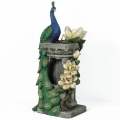 LuxenHome Resin Blue And Green Peacock Outdoor Fountain Garden Fountain With LED Light -Sunnydaze Decor Store GUEST e2854f46 b087 435b 8fb3 c282ae165230